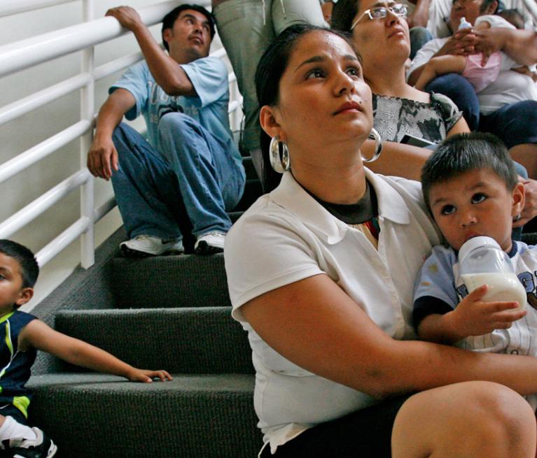 Families affected by immigration policy waiting